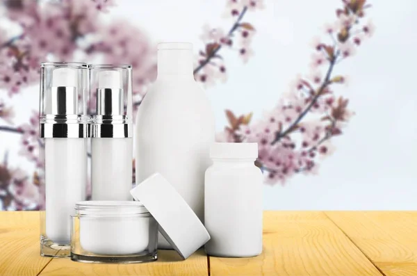 Set of cosmetic products on background