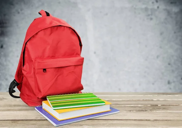 School Backpack with stationery, back to school background