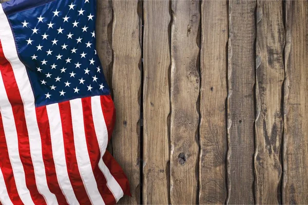 テキストの木製の背景にアメリカの国旗 — ストック写真