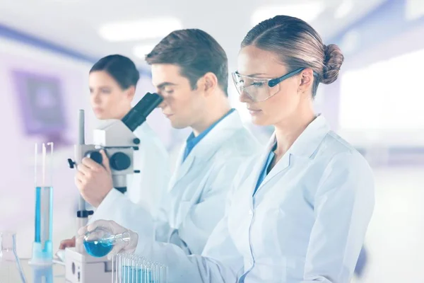 Group Scientists Working Microscope — Stock Photo, Image
