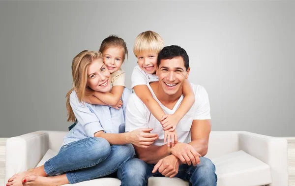 Young Family Home Smiling Camera — Stock Photo, Image