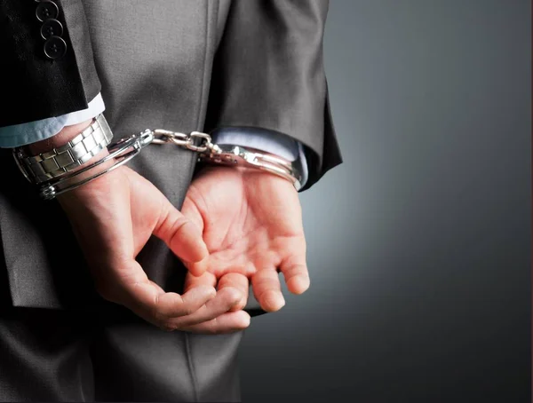 Man Handcuffs His Back — Stock Photo, Image