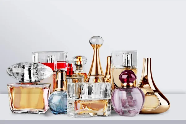 Aromatiska Parfym Flaskor Bakgrund — Stockfoto