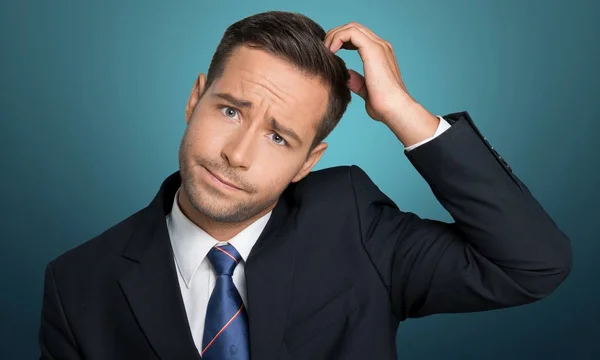 Confusing Young Businessman Background — Stock Photo, Image