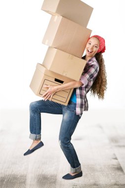 woman moving into new house with cardboard boxes  clipart