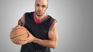 Basketbolcu topu tutuyor