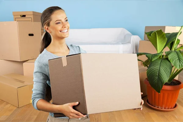 Girl moving into new house — Stock Photo, Image
