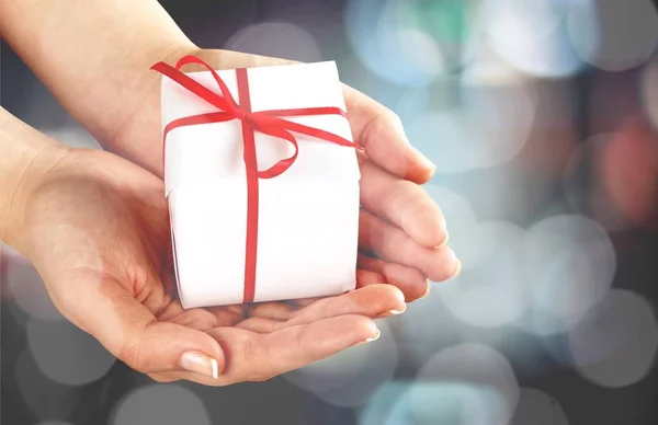 Close Photo Female Hands Holding Christmas Gift Box Background — Stock Photo, Image