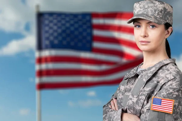 Female army soldier looking at camera