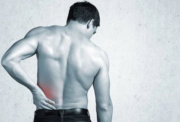 young man with back pain