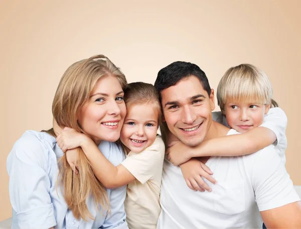 Young Family Home Smiling Camera — Stock Photo, Image