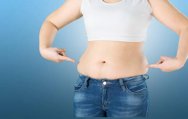 Woman with fat belly — Stock Photo, Image