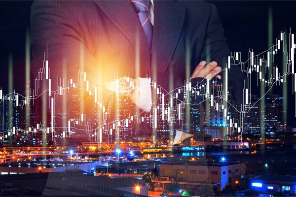 business man against dark night city
