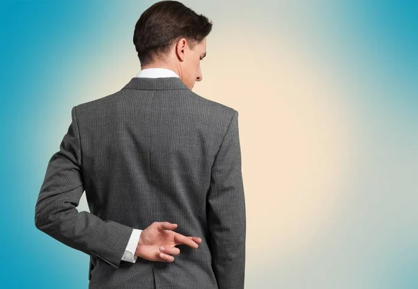 Handsome Man Suit His Finger Crossed His Back — Stock Photo, Image