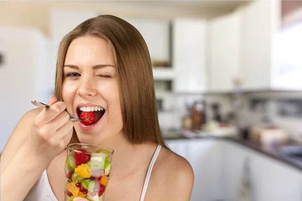 Young Happy Woman Eating Fruit Salad — 스톡 사진