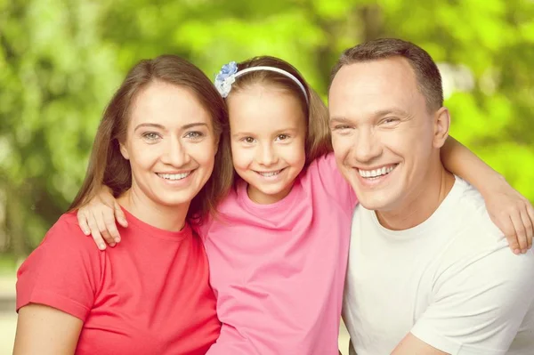 Feliz Familia Sonriente Con Hija Fondo —  Fotos de Stock