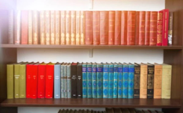 colorful shelves of books on shelf