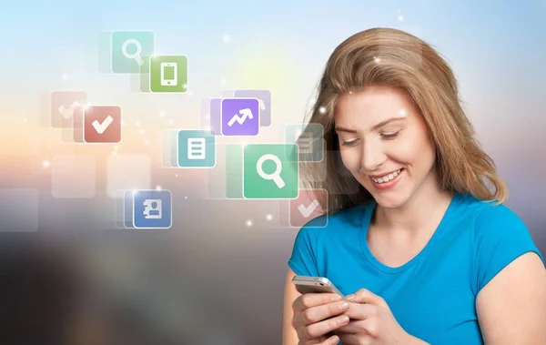 woman using mobile phone with icons