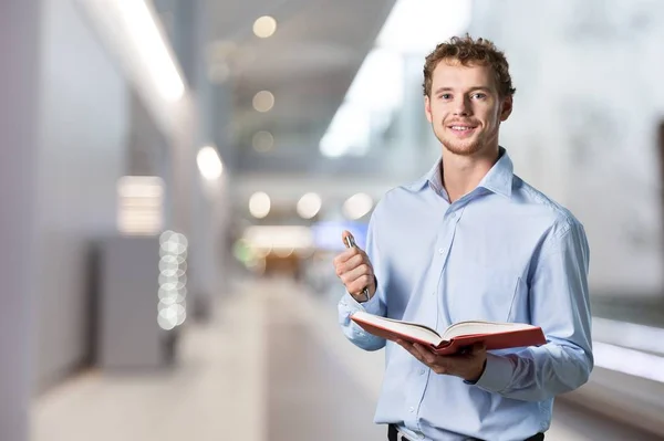 Smiling Young Man Notebook — Stock Photo, Image