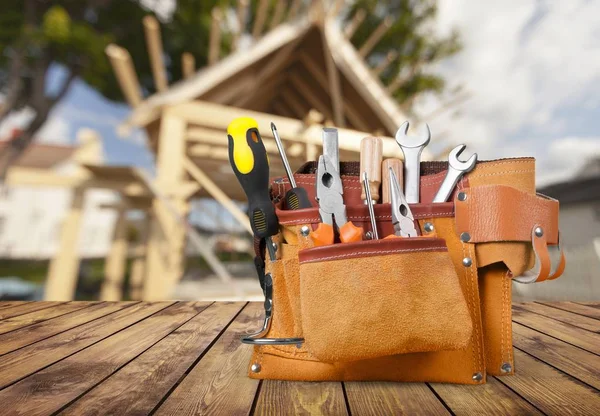 Tool belt with tools, close-up view