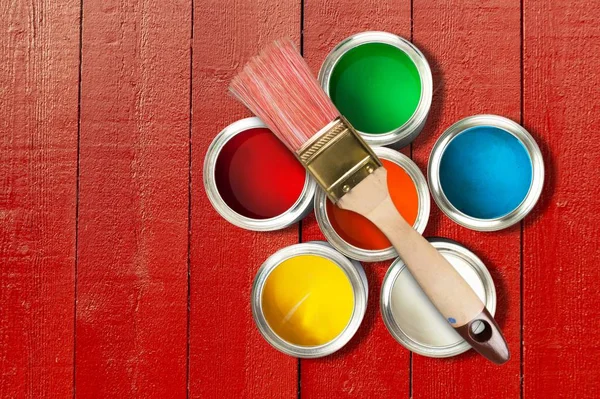 Multicolored Paint Cans Wooden Background — Stock Photo, Image