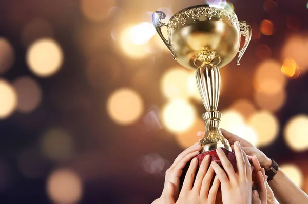 Hands Holding Golden Trophy Background — Stock Photo, Image