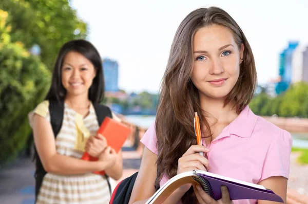 Happy Female Students Notebooks — Stock Photo, Image