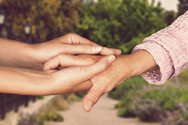 Hands Young Woman Senior Woman — Stock Photo, Image