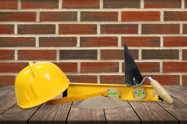 Yellow Hard Hat Tools Wooden Table — 스톡 사진