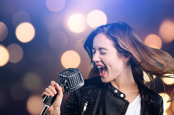 Young Woman Microphone Bokeh Background — Stock Photo, Image