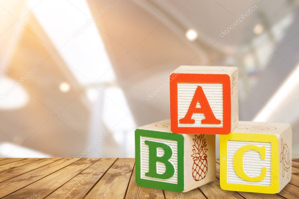 colorful toy blocks with letters