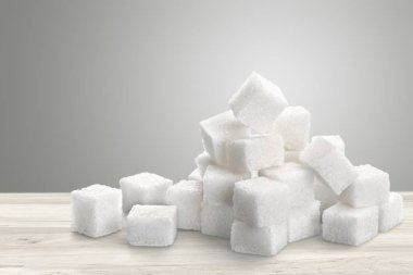 arkaplanda beyaz şeker küpleri