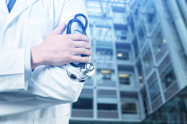 Médico Joven Con Estetoscopio Fondo — Foto de Stock