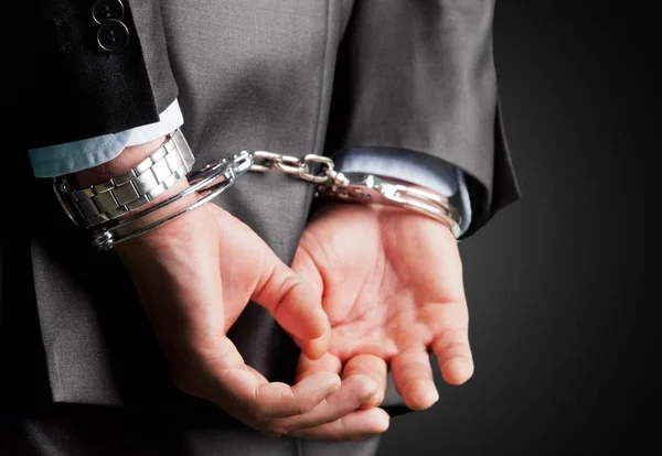 Man Hands Handcuffs Backgro — Stock Photo, Image