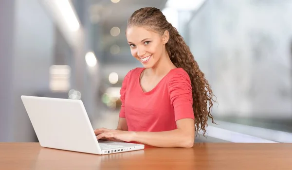 woman working with laptop in office