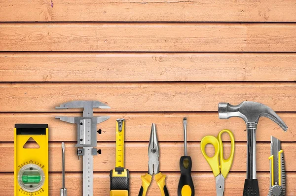 Fila Attrezzi Giardinaggio Sfondo Legno — Foto Stock