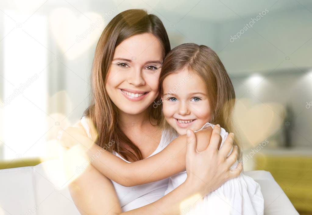 Happy Mother and daughter hugging 