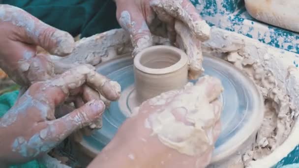 Potters Hands Work with Clay on a Potters Wheel — Stock Video