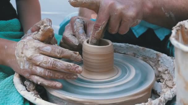 Potters Hands Work with Clay on a Potters Wheel. Slow Motion — Stock Video