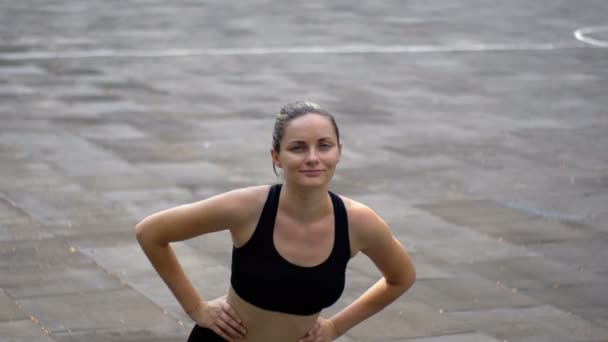 Young Athlete Woman in Sport Outfit Engaged in Fitness on the Sports Field in the Park. — Stock Video