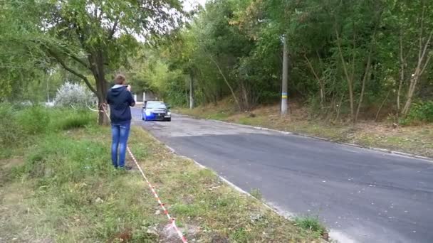 Championship in Rally. Rally Racing on sports cars on the asphalt road in the city — Stock Video