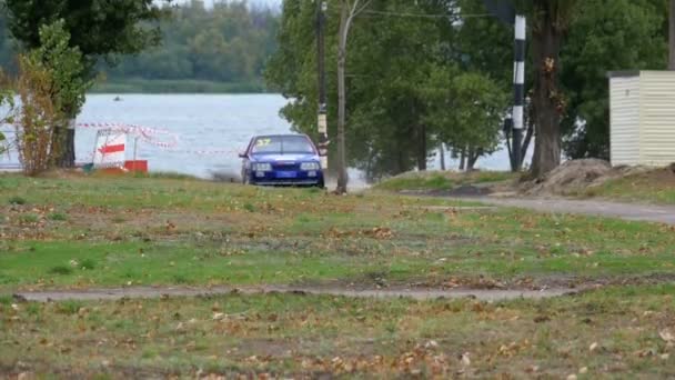 Championship in Rally. Rally Racing on sports cars on the asphalt road in the city — Stock Video