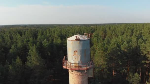 Old water tower in the forest. Aerial view from the drone — Stock Video