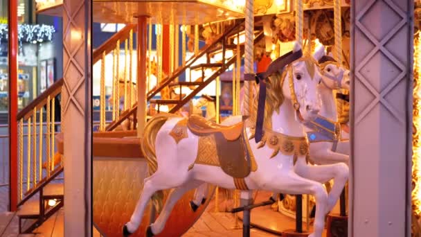 French Carousel with Horses in the Winter Evening — Stock Video