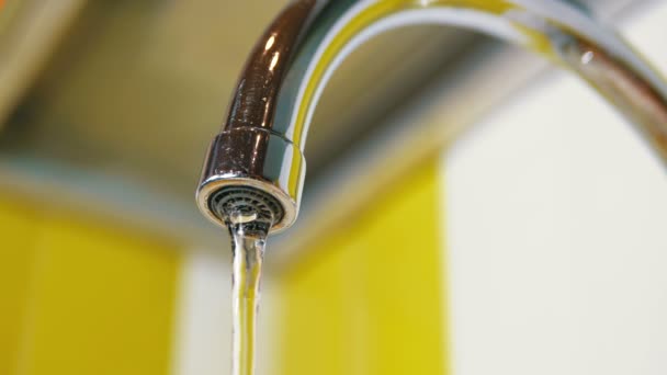 Water Running from the Tap into a Sink — Stock Video