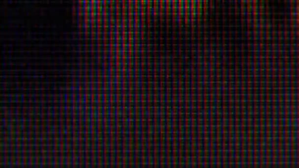 RGB пикселей на телевизоре во время показа фильма, макрос, крупный план — стоковое видео
