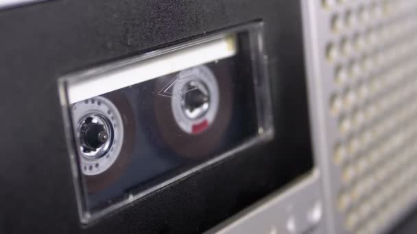 Audio Tape. Vintage Tape Recorder Plays Audio Cassette inserted therein — Stock Video