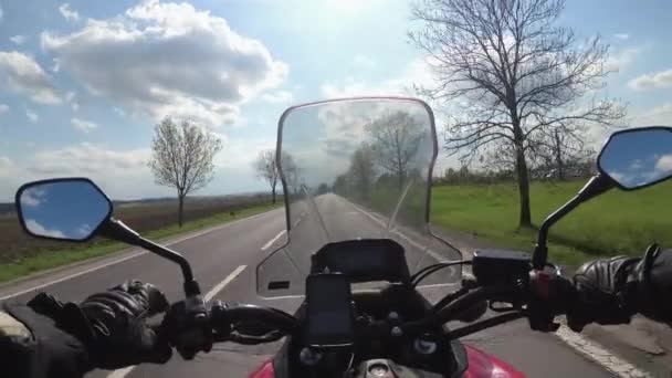 Motorcyclist riding on the Highway. View from behind the wheel of a motorcycle. POV — Stock Video