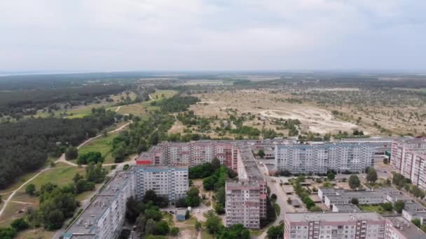 Aerial Panorama on City with Multi-Story Buildings near Nature and River — Stock Video