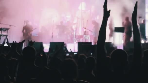 Crowd of Fans at Live Rock Concert Raise Hands and Dance (en inglés). Moción lenta 240 fps — Vídeos de Stock